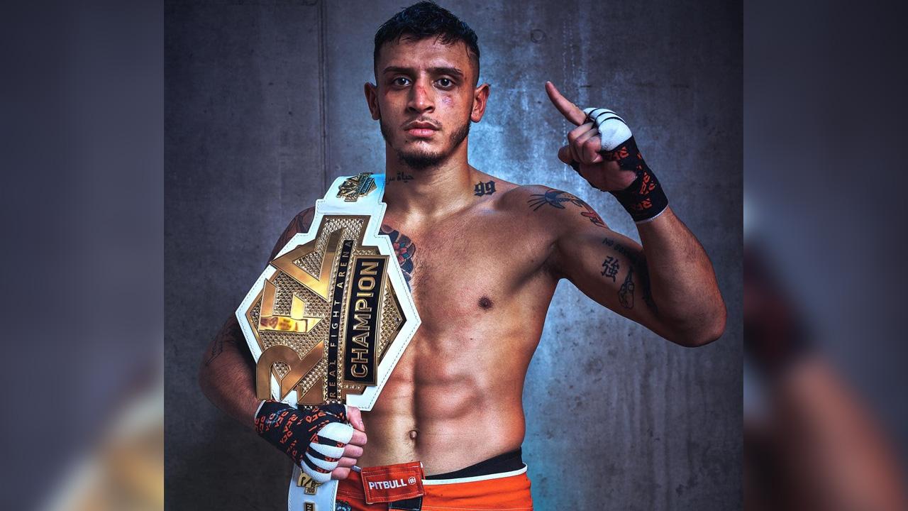 Václav Sivák on 17 December 2022 with the RFA champion belt.